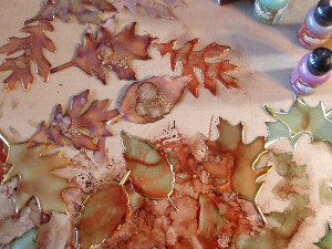 Apply alcohol inks to the leaves.