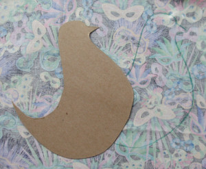 Freehand the chick on chipboard and cut out. Trace the pattern onto the wrong side of the fabric.